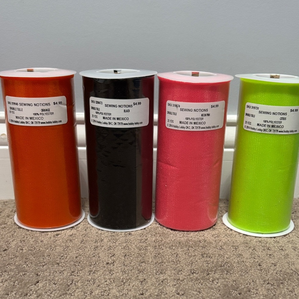 Sparkle Tulle Fabric Rolls 25 yards each from Hobby Lobby